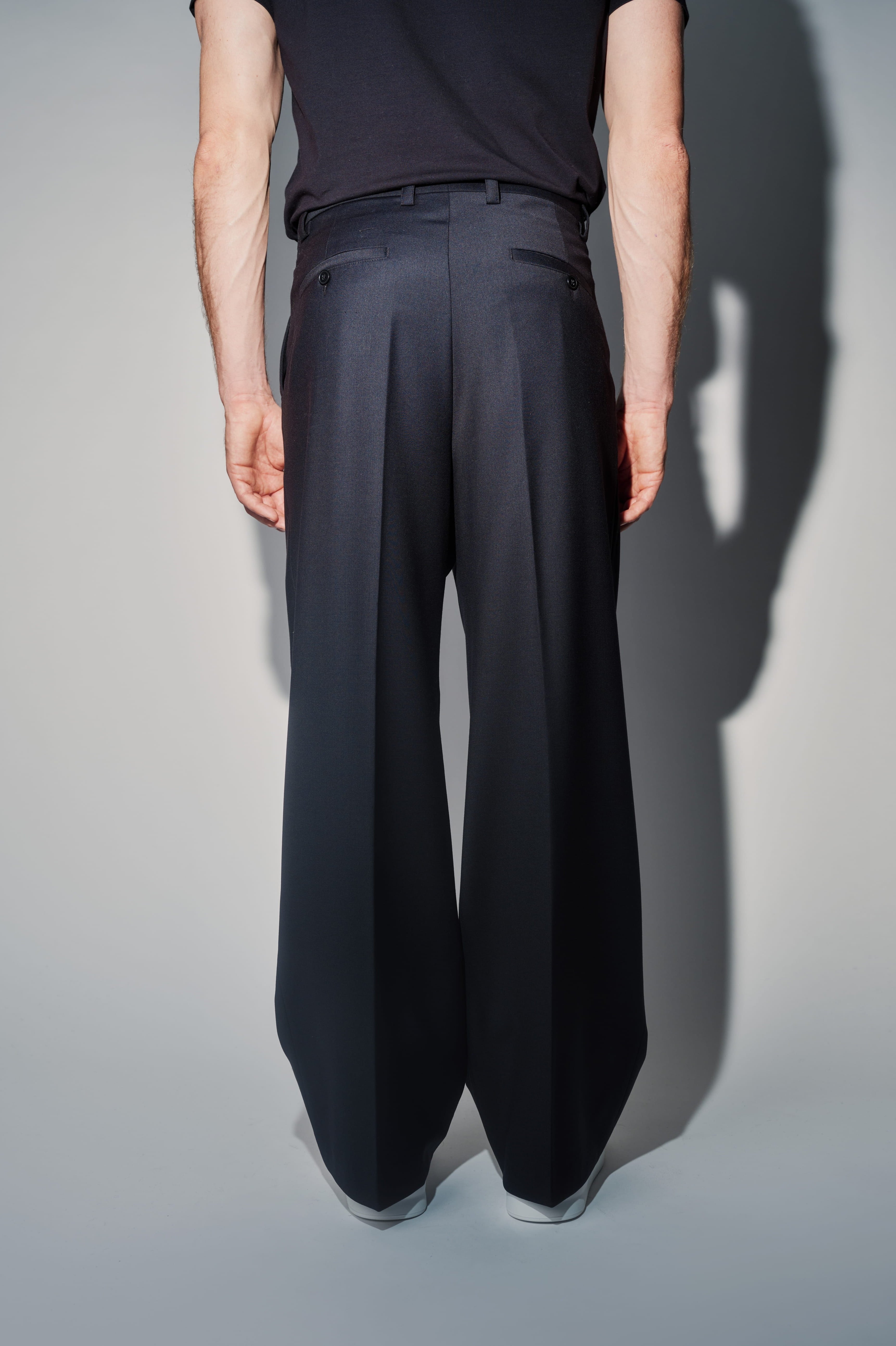 RÆR STUDIOS Pleated Wool Wide-Leg Trousers – Black