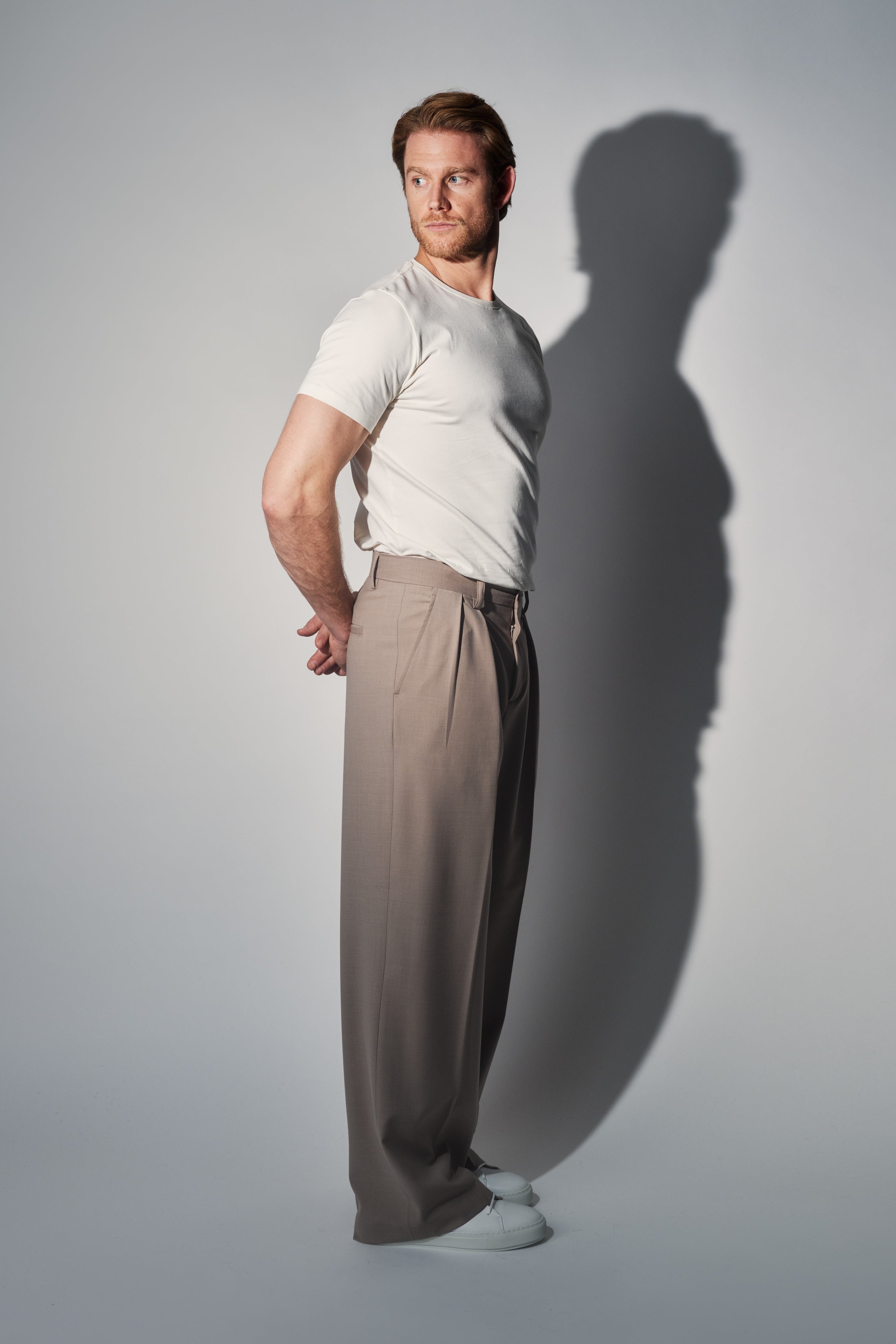 RÆR | RAER Pleated Wool Wide-Leg Trousers – Beige